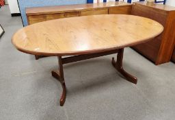 Mid-century G-Plan teak draw-leaf dining table of oval form, on curved splayed supports, 72cm high x