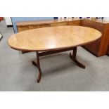 Mid-century G-Plan teak draw-leaf dining table of oval form, on curved splayed supports, 72cm high x