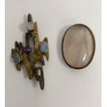 Modern silver brooch set with opals and other gemstones and an oval quartz set brooch (2)