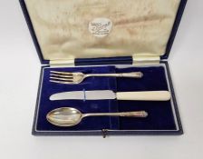 Child's part silver christening set of three pieces viz:- spoon and fork with angular handle,