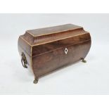 19th century mahogany sarcophagus-shaped tea caddy with inlaid decoration, the lid opening to reveal