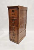 Early 20th century oak four-drawer filing cabinet with plaque 'The Shannon Limited, London', 44.