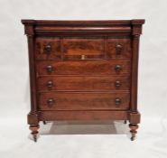 Victorian flame mahogany Scottish chest of drawers with three short and three long drawers, on