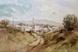 Two 20th century watercolour landscape paintings, the first depicting a village scene,