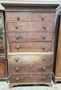 Antique mahogany chest on chest on chest, having two short over six long drawers, with circular