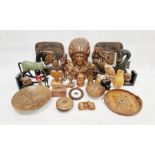Carved wooden Native American mask wearing feathered headdress and quantity other wooden and