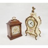 Mid-century mahogany-cased mantel clock by Elliot Clock Company, the circular dial with Roman