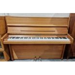 Late 20th century oak upright piano by Knight, measuring approx. 112cm high, 140cm wide, 55cm