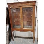 Early 20th century mahogany glazed display cabinet, the two doors opening to reveal two adjustable