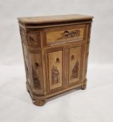 20th century oriental decorated drinks cabinet, with relief carved decoration of figures on a