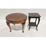 Mahogany circular occasional table, 55cm diameter, and a lacquered two tier occasional table, 46cm