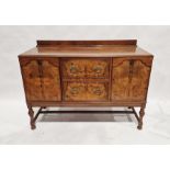 20th century burr walnut sideboard with pair of drawers flanked by pair of cupoboards, on turned
