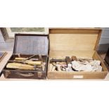 Two vintage wooden toolboxes containing vintage and wooden tools, mainly chisels, some named to