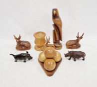 Carved wooden rhinoceros marked 'Monde', other carved wooden African animals, wooden carved bowls,
