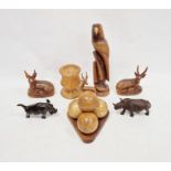 Carved wooden rhinoceros marked 'Monde', other carved wooden African animals, wooden carved bowls,