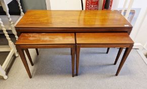 Nest of three mid-20th century mahogany trio occasional tables, probably by Richard Hornby, to