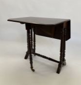 Mahogany Sutherland table, rectangular with cut-off corners, on ring turned supports, opening to