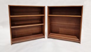 Pair of mid-century teak Nathan bookshelves, each having one fitted shelf and one adjustable