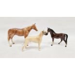 Beswick model of a Great Dane together with two models of horses, unmarked (3)