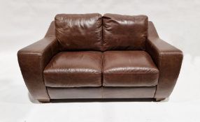 Modern leather upholstered two-seater sofa by Sofa Italia, 68cm high x 152cm wide x 92cm deep