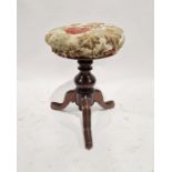 19th century rosewood circular revolving piano stool, red buttonback leather seat on tripod base