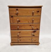 Pine chest of five drawers on plinth base, 103cm high x 76cm wide x 44cm deep