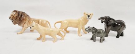 Beswick lion family group comprising of a lion, lioness, and a lion cub, a Beswick model of an
