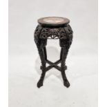 Early 20th century Chinese hardwood jardiniere stand of circular form with marble insert to the top,