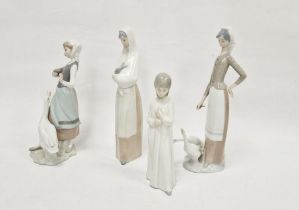 Lladro figurine of a woman with a goose, a Lladro figurine of a woman with two geese, model number
