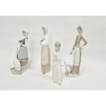 Lladro figurine of a woman with a goose, a Lladro figurine of a woman with two geese, model number