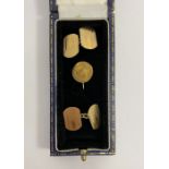 Pair of 9ct gold cufflinks, 2g approx. and a ECC Ltd long service 9ct gold pin, 1g approx. (2)