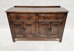 20th century dark oak sideboard, two drawers with two below, two door cupboards, 89cm high x 147cm