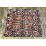 Ersari engsi wool rug, the quartered pale madder field with geometric decoration and having broad