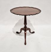 19th century mahogany tilt-top occasional table with scalloped edge, raised upon tri-pod supports