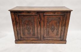Mahogany side cupboard with pair of panelled doors, engraved decoration, on plinth base, 82cm high x