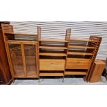 1970's Ladderax teak shelving unit for Staples, four section with a two-door glazed display