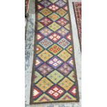 Maimana kilim blue ground runner with trelliswork of lozenge medallions , 207cm x 65cm