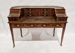 Edwardian mahogany Carlton House desk with satinwood inlaid borders, brass gallery to the top, the