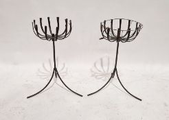 Pair of wrought iron flower baskets on tripod stands with seven various garden planters (9)
