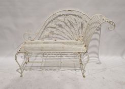 White painted wrought iron garden chaise longue with fan back and leaf decoration