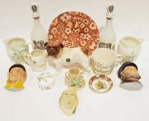 Wedgwood 'Peter Rabbit' nursery ware cup and saucer, a pair of Coalport decanters, a brass trivet,