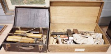 Two vintage wooden toolboxes containing vintage and wooden tools, mainly chisels, some named to