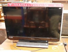 A Samsung 22in flat screen TV, model no. UE22F5400AK with controller, together with a Toshiba 32in