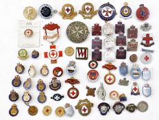 Collection of nursing and civil defence badges