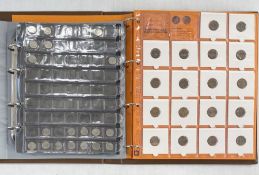 Two folders of Dutch coins, pre-euro and euro, first folder containing two and a half guilder from