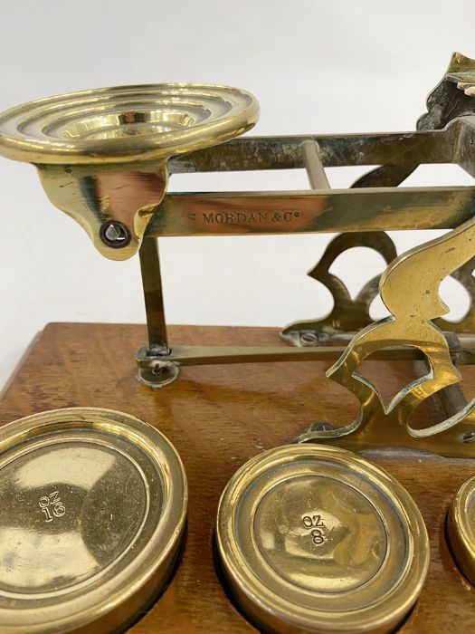 Set of late 19th century Sampson Mordan and Co. postal scales, with seven graduated weights on oak - Image 4 of 10