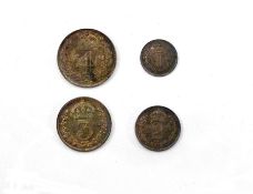 Cased set of four Maundy coins 1891 in 1899 case