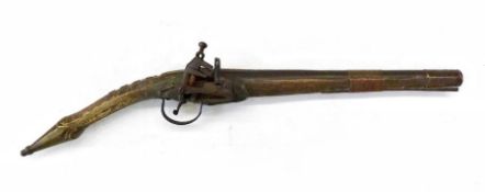 Early 19th century Middle Eastern flintlock pistol, with ornately decorated handle and pommel,