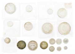 Group of 18 silver coins including Edward VII 1909 half crown, 1826 shilling, 1938 half crown and