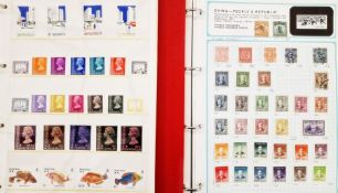 All world boxed four album A-Z collection of mint and used definitives, commemoratives and others